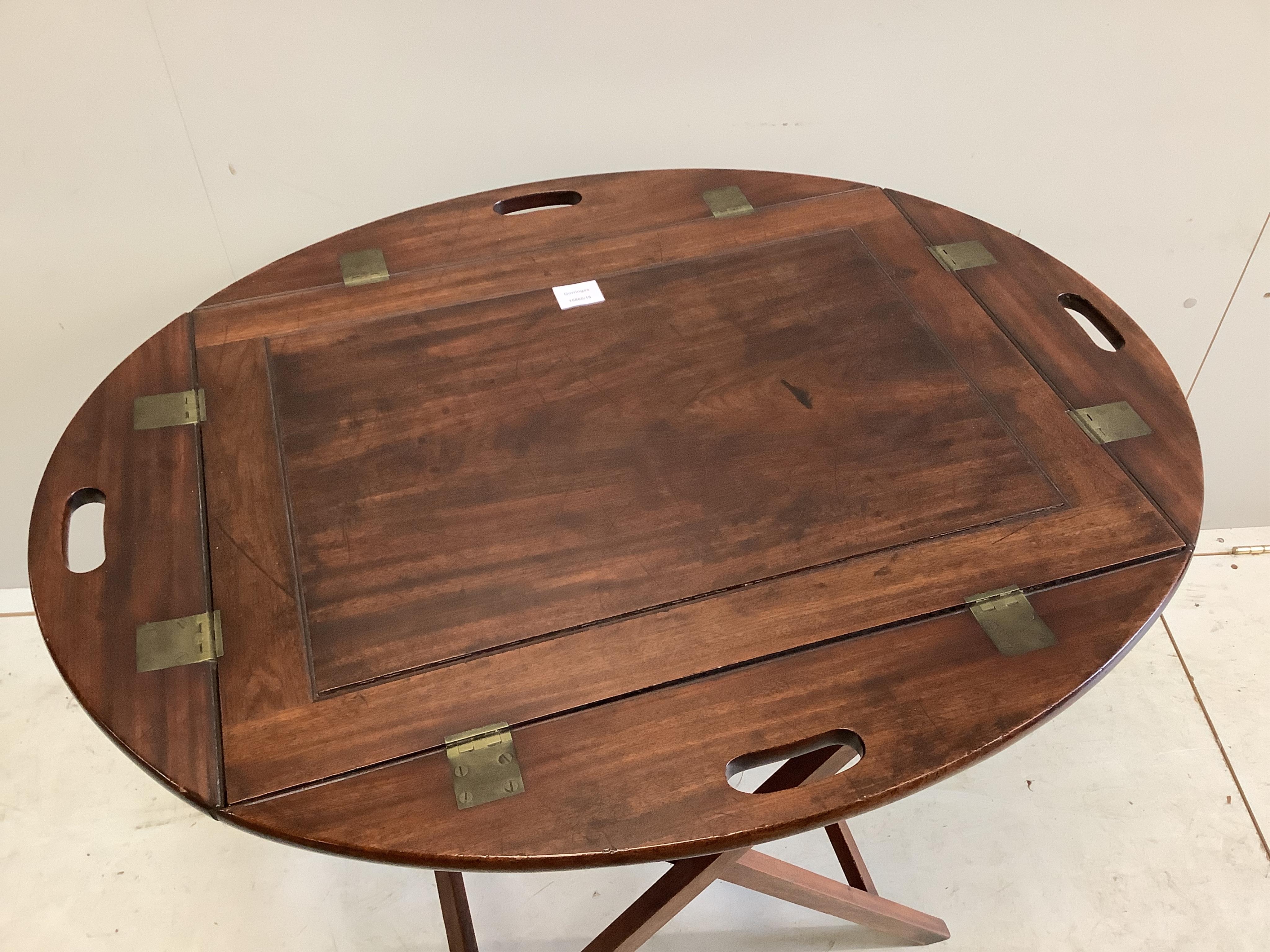 A Victorian mahogany butler’s tray on folding stand, width 70cm, depth 52cm, height 85cm. Condition - fair to good